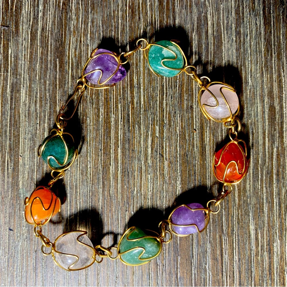 Beaded bracelet with gold accents and clip